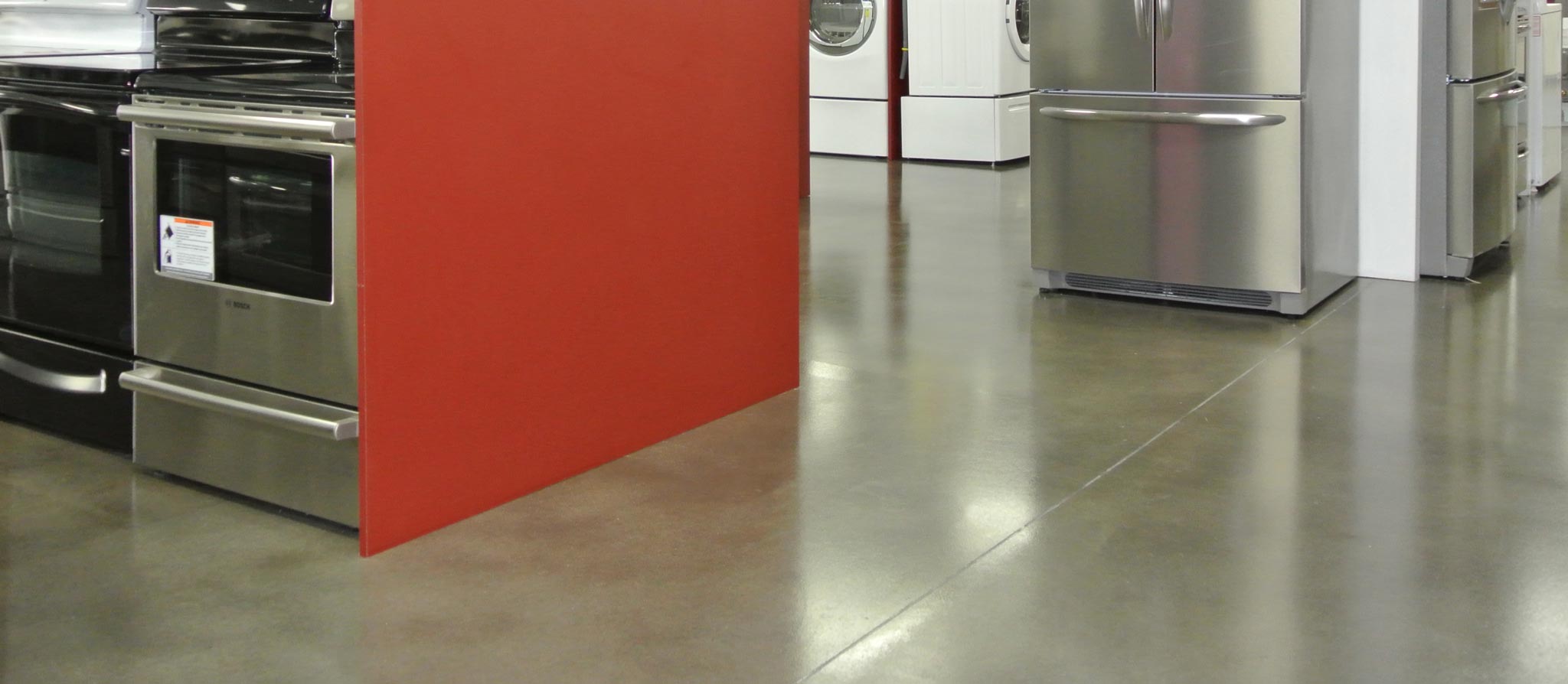 Brubaker Appliance Center polished concrete floor 02 Looking for Inexpensive Polished Concrete Just Grind Seal | Duraamen Engineered Products Inc