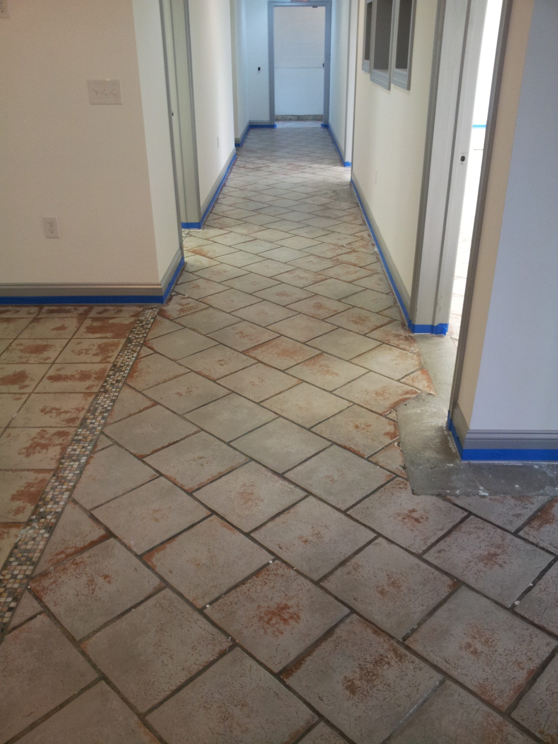 Existing Substrate Ceramic Tile Poured cement flooring at Cressi showroom in Saddle Brook NJ | Duraamen Engineered Products Inc