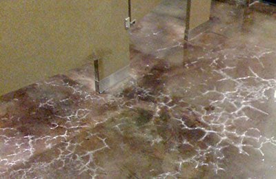 Acrylic concrete sealer that failed, bubbled, cracked and flaked