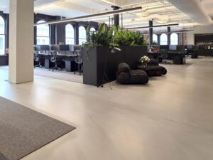 Aritzia Women's Boutique offices in NYC use a concrete overlay floor by duraamen. Image 3