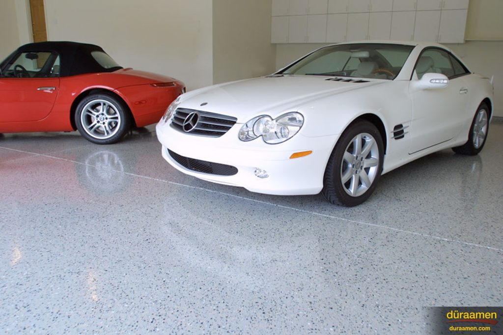 Another view of this auto showroom that has had Duraamen's Endura resin chip flooring system installed.