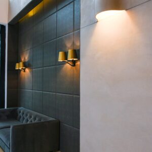 Industrial-style lobby with Param 5500 self-leveling concrete floors and exposed brick walls in New York City.