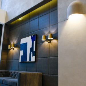 Chic apartment lobby with polished Skraffino microtopping floors and Param 5500 self-leveling concrete.