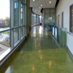 This hallway had it's flooring resurfaced in a multi-color scheme that fits the buildings interior design at Southern Connecticut State University (SCSU).