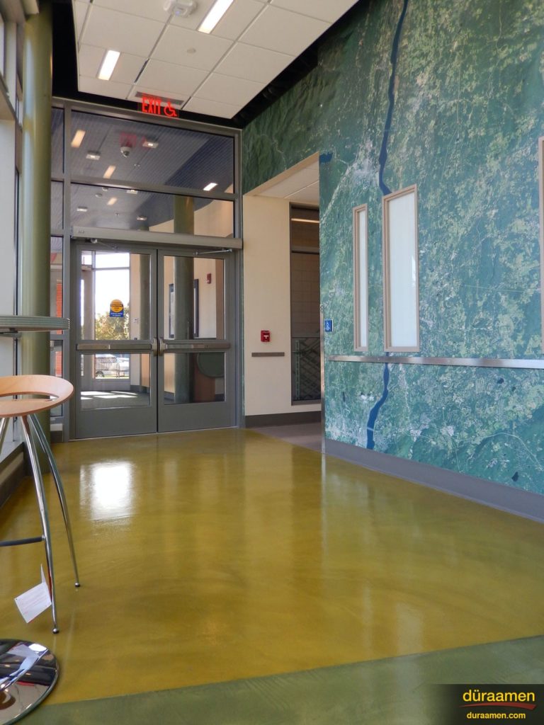 The hallways in this building at Southern Connecticut State University were resurfaced using Pentimento semi-self-leveling concrete from Duraamen.