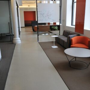 The warm gray is the perfect contrast to the white walls and bright colors.