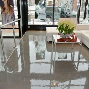 You can just glimpse the flooring of the entrance in the left of the photo. It has a matte appearance as it has a non-skid surface, compliments of Skraffino microtopping and a non-skid additive.