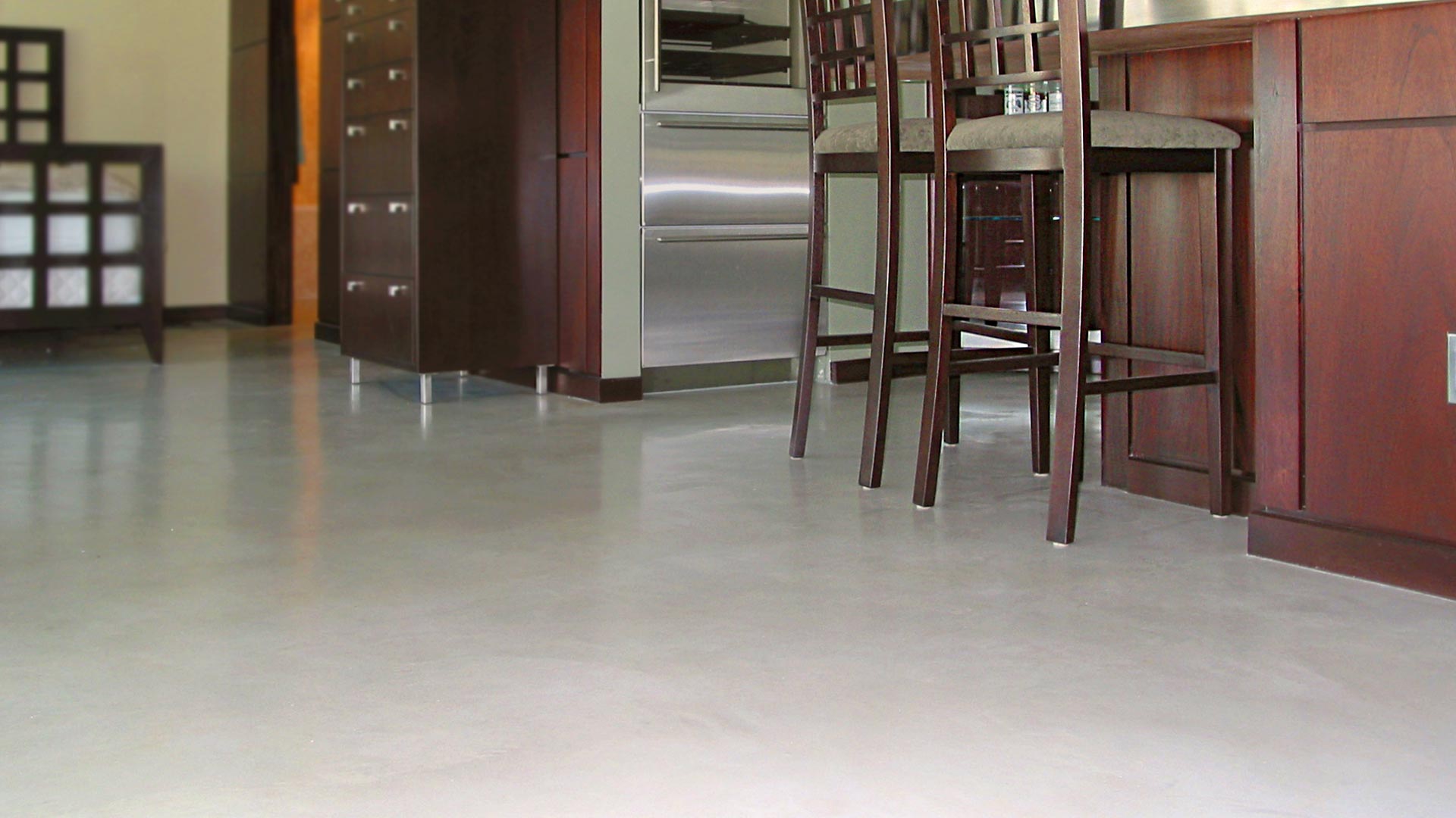 Residential luxury home with designer concrete flooring and kitchen island Duraamen Blog   Case Studies Technical Articles and more | Duraamen Engineered Products Inc