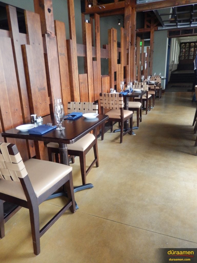 Seating area with matte finished concrete Blue Bell Inn in Blue Bell, PA.