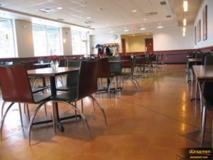 The cafeteria at this grocer chose a decorative polished concrete floor for its aesthetic value and easy maintenance.