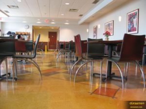 Decorative polished concrete is seen here for use in a grocery stores cafeteria.