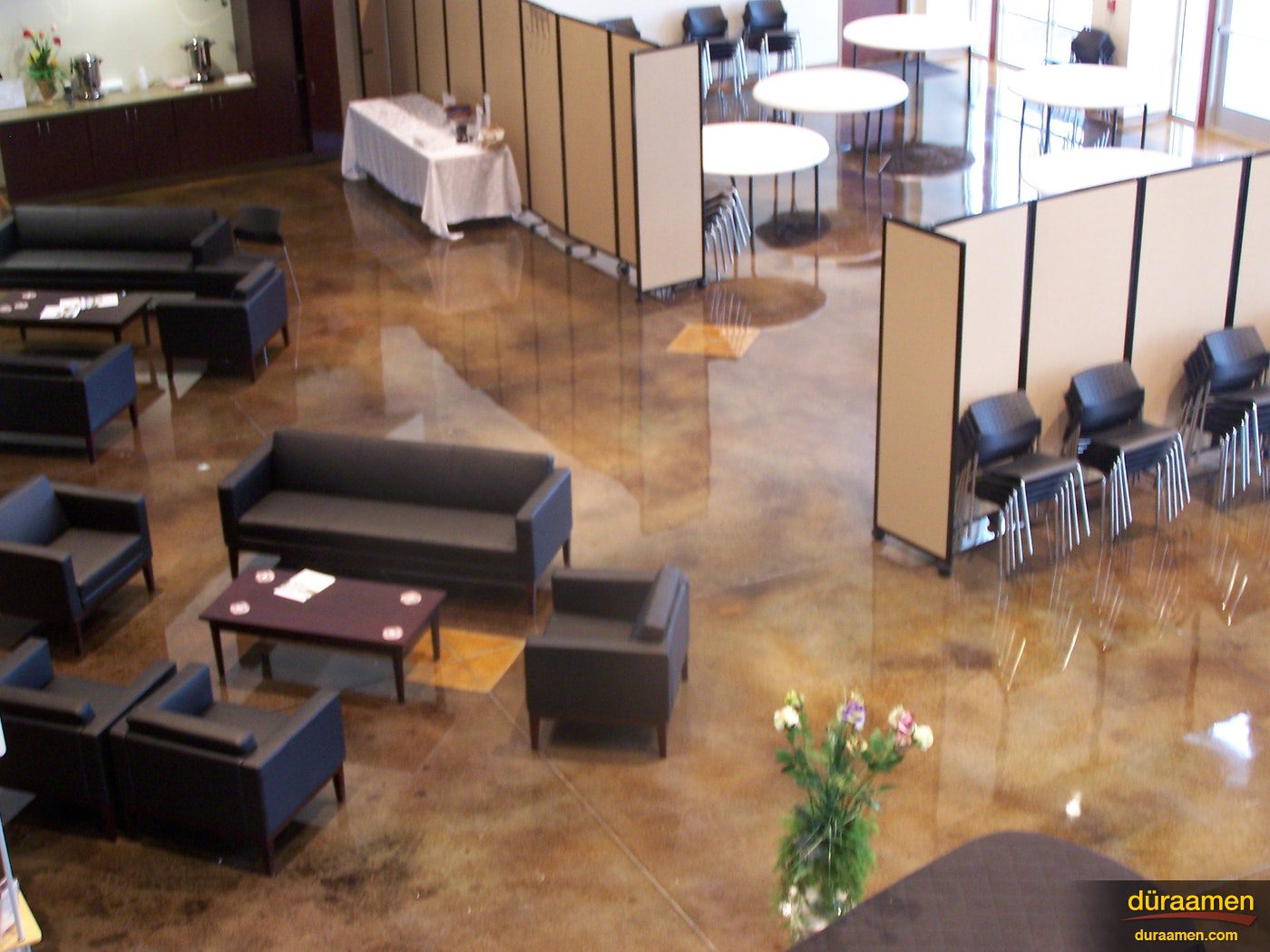 High shine dyed concrete in the church banquet center as shown from above Polished Stained Concrete Floors in a Church in Tulsa OK | Duraamen Engineered Products Inc