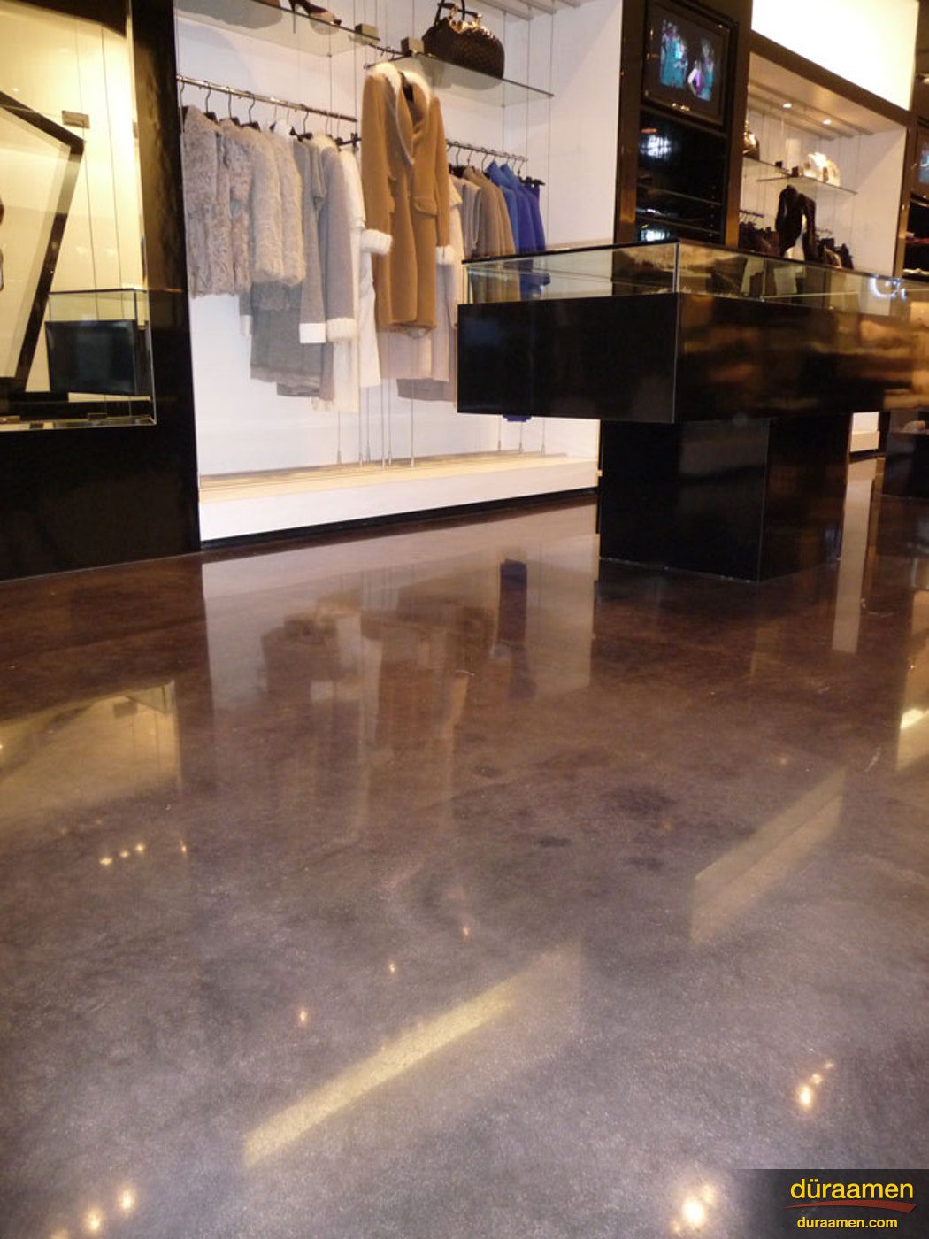 Retailers such as this clothing store appreciate the super high gloss shine polished concrete offers Polished Concrete Floor in a Clothing Store Englewood NJ | Duraamen Engineered Products Inc