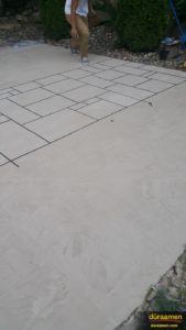 Decorative patio concrete with unique grid-like patterns using Uberdek.