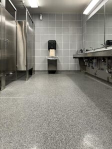Restroom resin chip flooring by duraamen. 2729