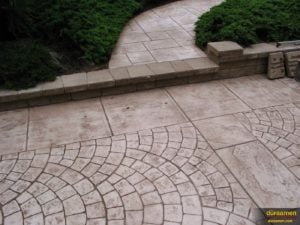 Stampable concrete overlays can produce many patterns like brick shown here.
