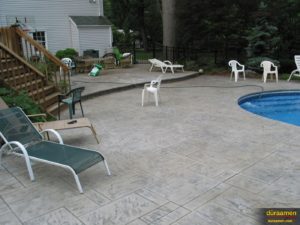 Pool areas are perfect for the application of stampable concrete overlays.
