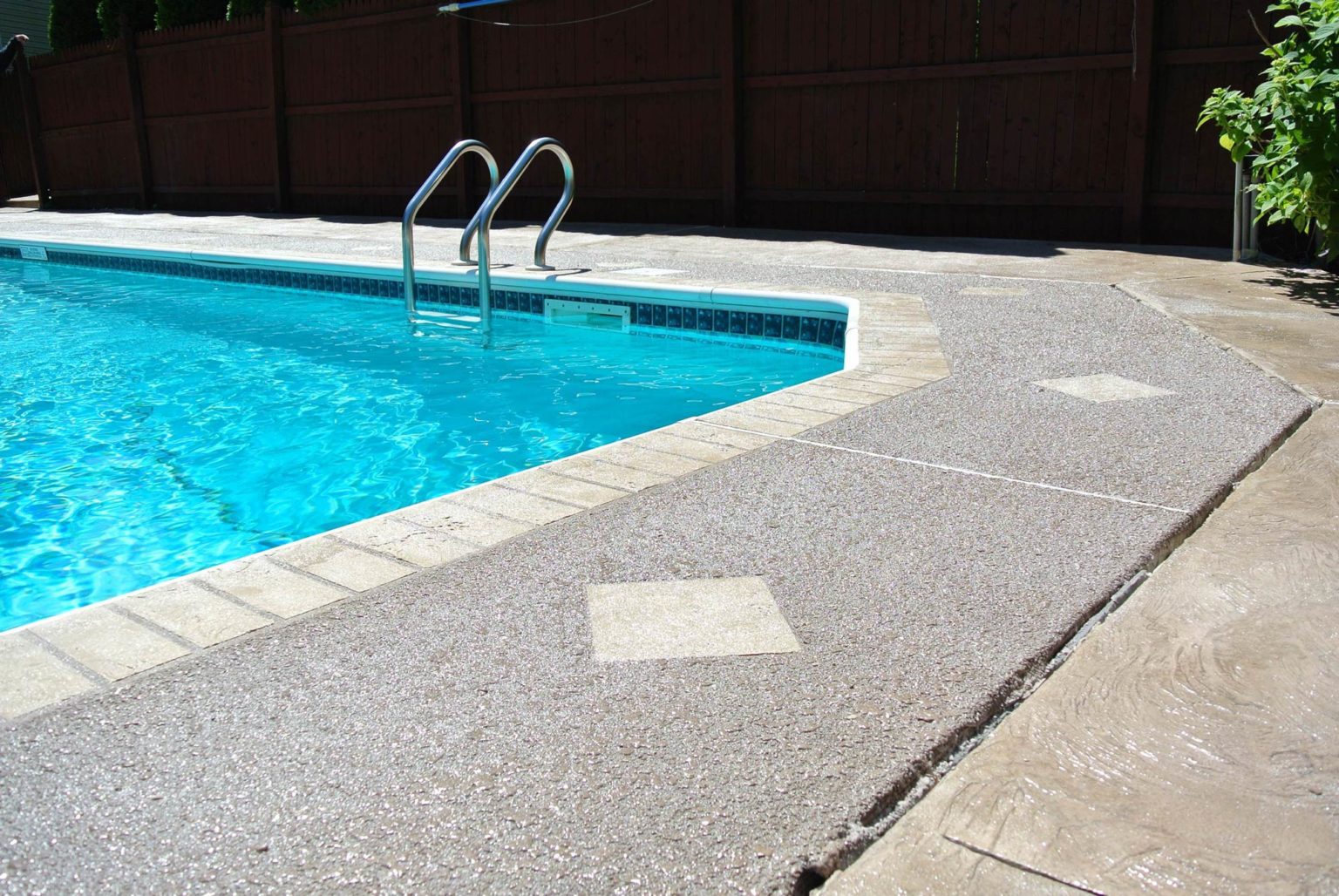 how-to-spruce-up-your-concrete-pool-deck