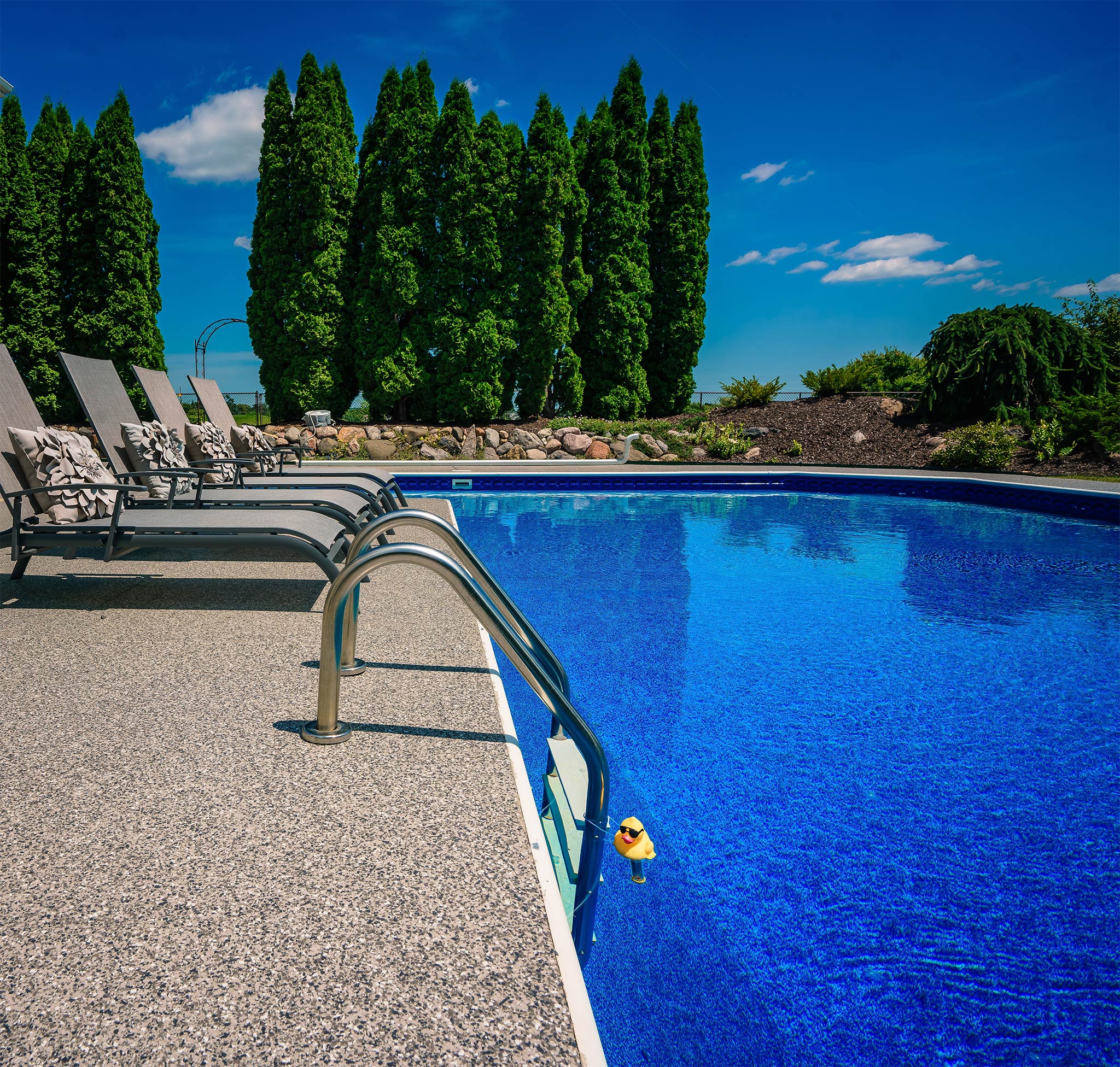 nbspUV Stable Polyaspartic resin chip flooring on a pool deck | Duraamen Engineered Products Inc