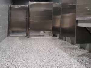 Restroom resin chip flooring by duraamen. 0001