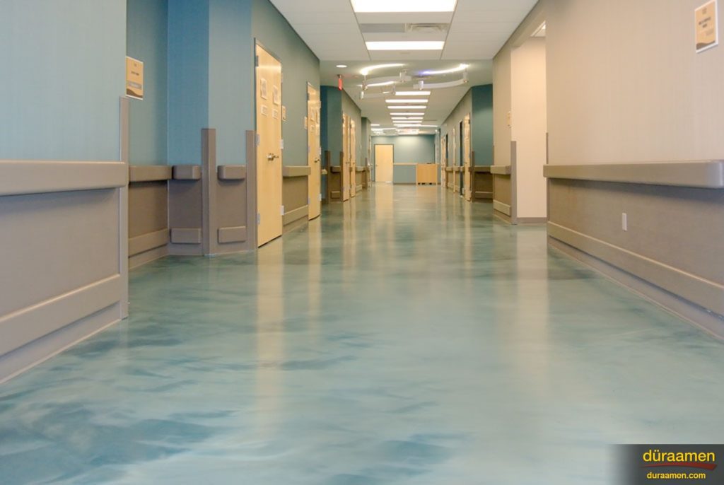 Metallic epoxy flooring enhances the hallways at the The Head Injury Association's Wintesky Bridges Center.