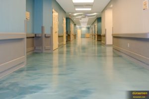 Metallic epoxy flooring enhances the hallways at the The Head Injury Association's Wintesky Bridges Center.
