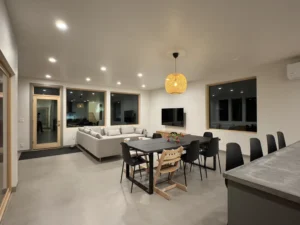 Modern living space with light gray Arapido microcement flooring