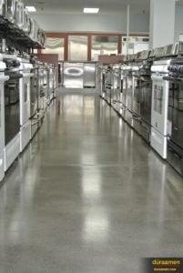 Appliances appear brighter with a polished concrete floor.