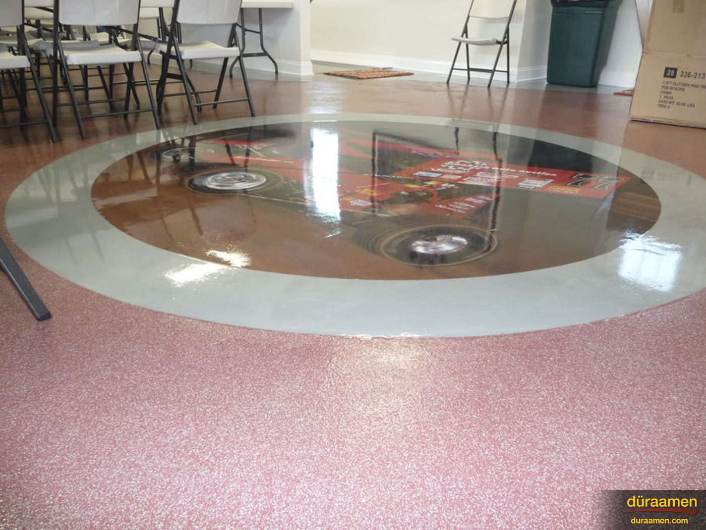 Garage floor epoxy coatings are ideal for meeting rooms as they offer protection and from and easy clean up of spills and liquids Vinyl Chips flooring in a meeting hall in Harrisburg PA | Duraamen Engineered Products Inc