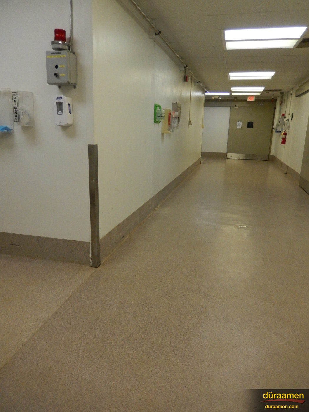 Kwortz Decorative quartz flooring system was installed in Novel Industries Pharmaceutical plant located in Caldwell NJ Double broadcast Colored Quartz Flooring in Pharmaceutical | Duraamen Engineered Products Inc