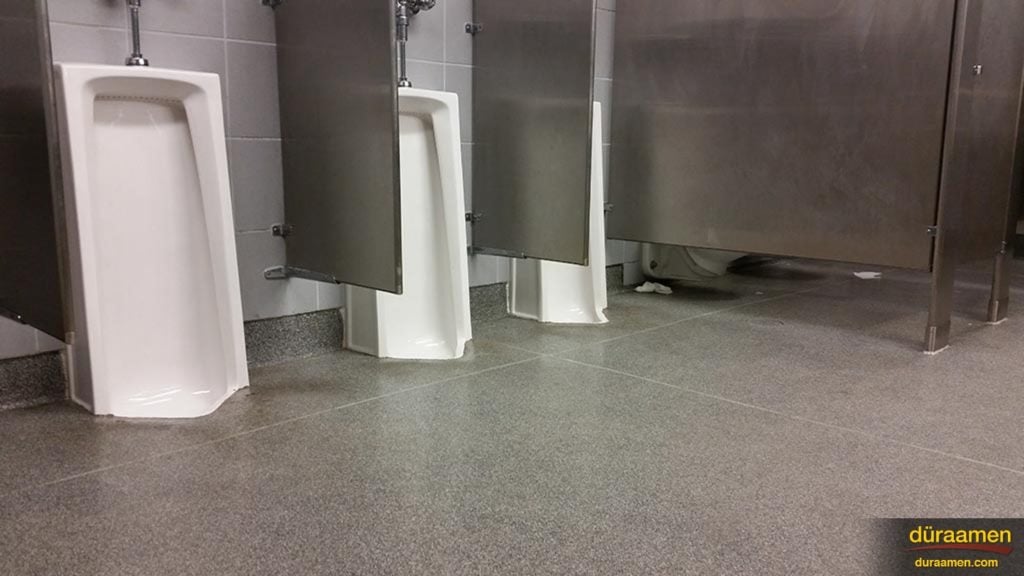 Overflow from urinals is no match for Kwortz flooring.