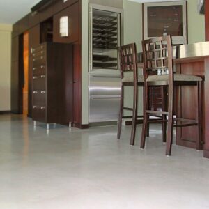 Residential kitchen with Skraffino micro topping floor system.