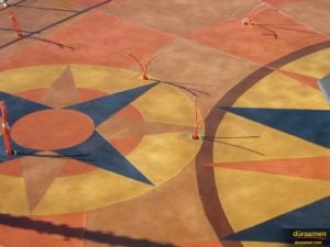 The complex sundial pattern was achieved using exterior concrete resurfacing products from Duraamen.