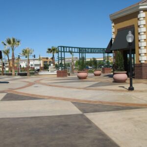 This outdoor lifestyle center features a decorative concrete overlay that was created with Duraamen products.