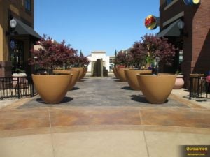 Retail lifestyle centers utilize exterior concrete overlays to beautify their outdorr areas, and protect them from massive foot traffic.