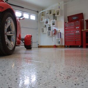 This hot rod garage has a high shine flooring thanks to Duraamen's epoxy resin chip system.