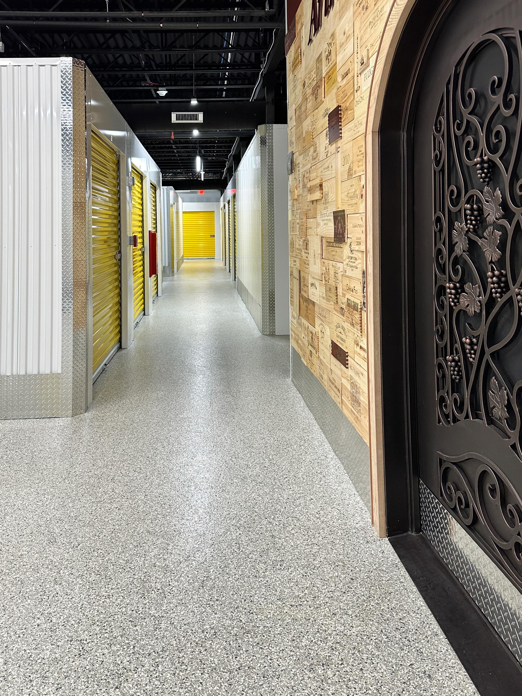 Duraamens epoxy floor coating and resin chips with a polyaspartic topcoat used as the flooring in this self storage facility Hallway photo 6 Epoxy Resin Chip Floor Used in Self Storage Space | Photos | Duraamen Engineered Products Inc