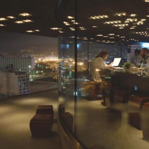 Concrete resurfacing project: Stereokitchen at night looking into the bar.