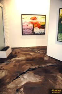 Around every corner is a work of art, and metallic epoxy flooring.