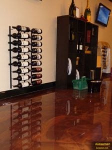 The dark colored floor displays this wine store's merchandise flawlessly.